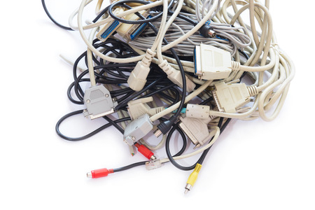 Mass of Tangled up Wires, Connections and Old Cables. Isolated on White.の写真素材