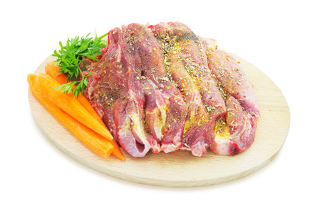 Raw Pork Chops with Spice Isolated on White Background.の写真素材
