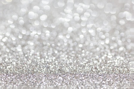 Silver Glitter for Christmas Background with Blurred Lights.の写真素材