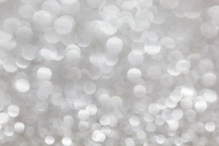 Silver Abstract Christmas Background. Defocused Blurred Lights.の写真素材