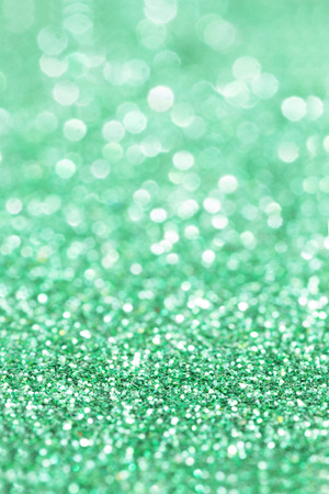 Green Glitter for Christmas Background with Bokeh Lights.の写真素材