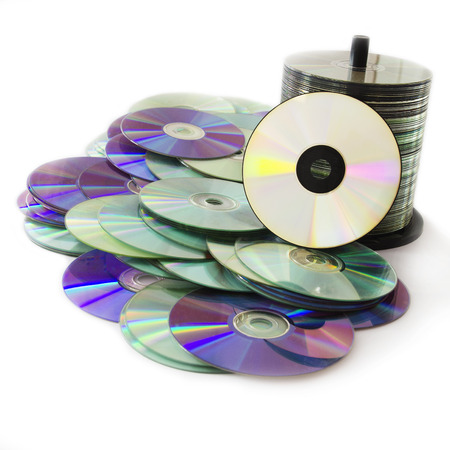 Stack of CD and DVD Discs Isolated on White Background.