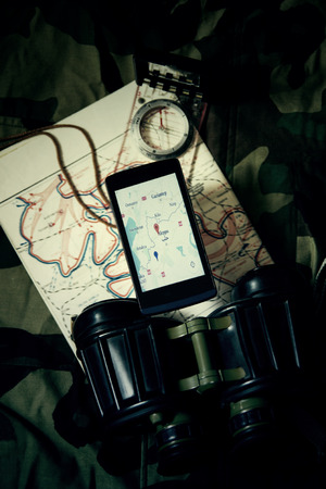 Military Equipment and Mobile with a Map of Syria - Aleppo. Image is Retro Filtered.の写真素材