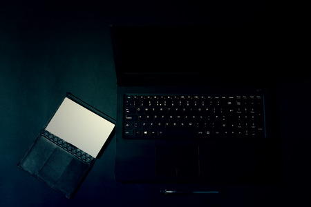 Working place at the office. Top view with copy space. Black office concept.の写真素材