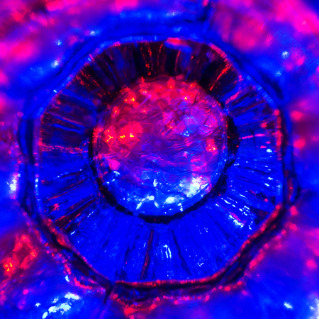 Close up of detail of a old crystal glass. Abstract background.