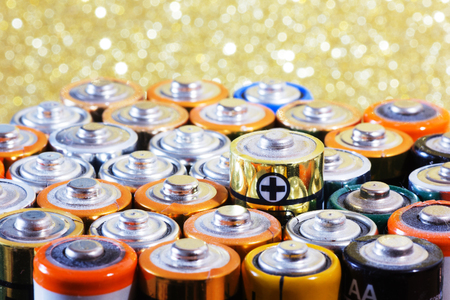 Group of old used batteries for recycling in different size. Selective focus.の写真素材
