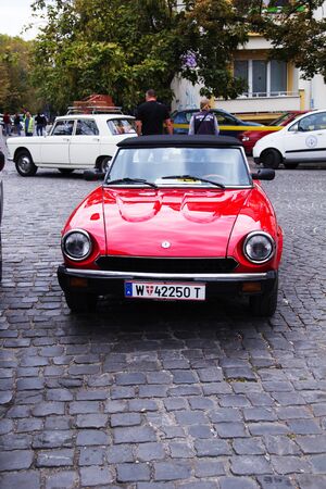SKOPJE MACEDONIA - SEPTEMBER 29 2018: Retro car and motorbikes on exhibition of vintage auto. The...