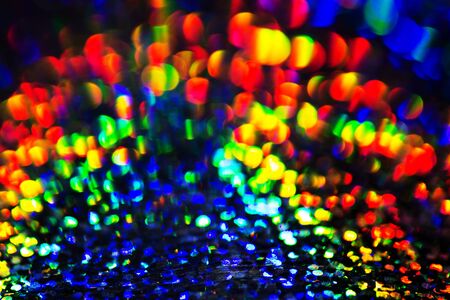 Abstract and festive background with blurred circles. De focused blurred lights.