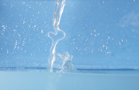 Two large hearts of water and small heart water dropsの写真素材