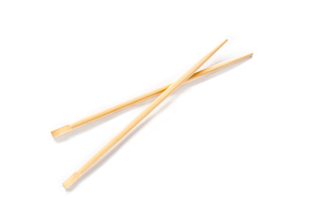 Pair of chopsticks on white backgroundの写真素材