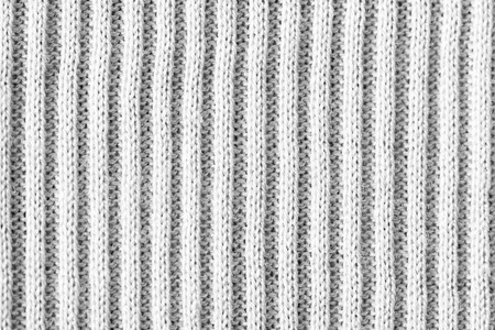 Abstract white knitted fabric texture background