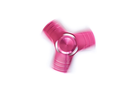 Hand spinner. A fidget toy for increased focus, stress relief on white backgroundの写真素材