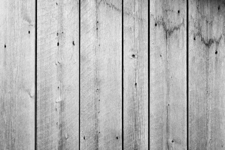 Old weathered gray wood wall outsideの写真素材