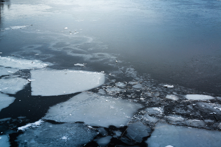 Climate change with cracked ice on lakeの写真素材