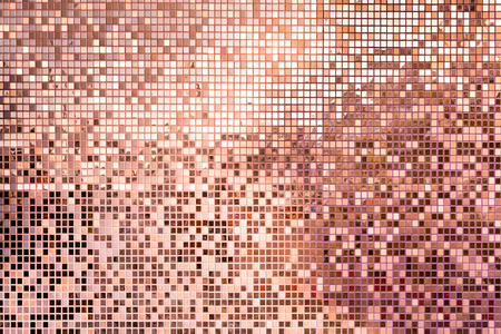 Pink rose gold square mosaic tiles for texture backgroundの写真素材