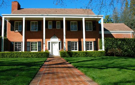 Expensive home in a residential neighborhoodの写真素材