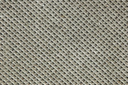 Closeup of a textured concrete electrical cover