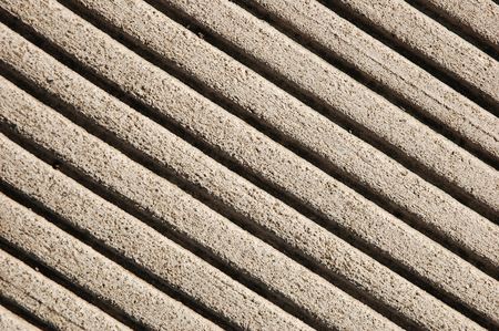 Closeup of lines pressed into a concrete sidewalkの写真素材