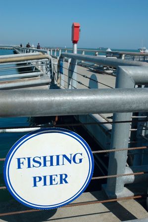 Sign at the entrance of a fishing pierの写真素材