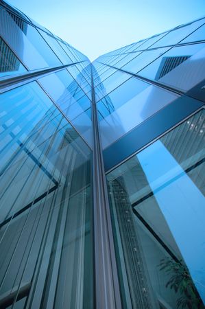 Details of a skyscraper set against the blue skyの写真素材