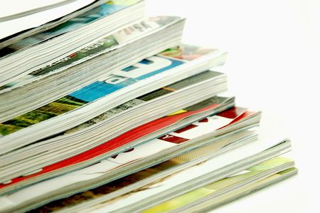 Stack of magazines on an isolated background