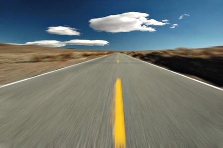 Empty road in the middle of the desert, Eastern Sierra Mountains, California