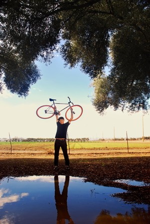 Portrait of a fixed gear cycling enthusiast in California farm countryの写真素材
