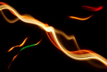 Streaks of colorful lights in motion