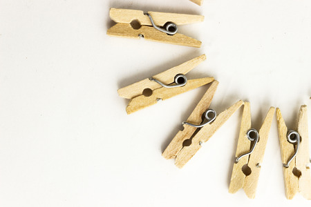 wood clothespin isolation in white background photo