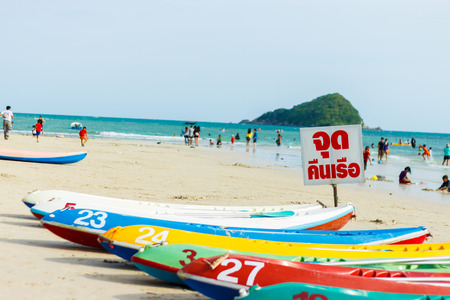 colorful boat on beach,blue sky backgroundの写真素材