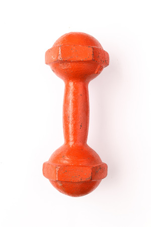 Old dumbbell orange color on white backgroundの写真素材