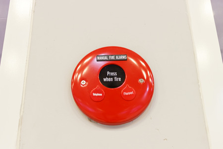 Fire alarm on the wall of shopping center.