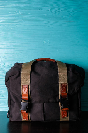 close up vintage bag on wood table backgroundの写真素材