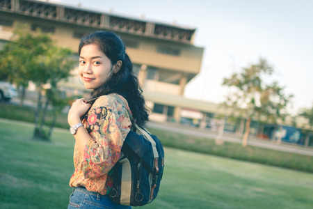 asian woman with bag, traveler, vintage tone styleの写真素材