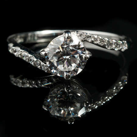 close up silver diamond ring with reflectionの写真素材