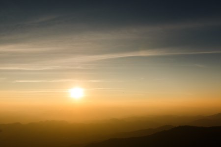 beautiful color sunset at mountain, Khun Chang Khian, Chiang Mai Thailandの写真素材