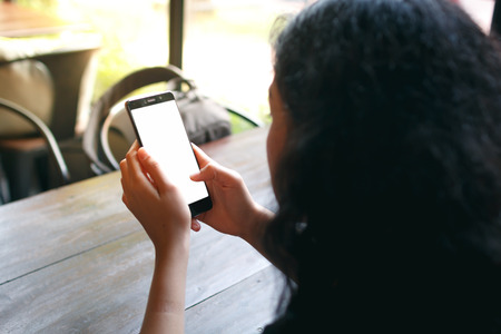 traveler young beauty asian woman sitting at chair and use smartphone, traveling at bangkok thailandの写真素材