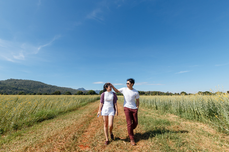 couple asian on natural background travel in thailandの写真素材