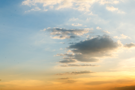 beautiful view of colorful sunset sky with cloud at evening and silhouette city on foregroundの写真素材