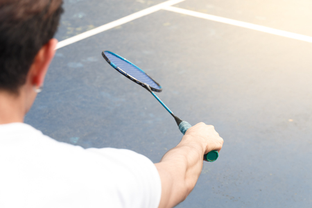 asian sport man badminton player on fieldの写真素材