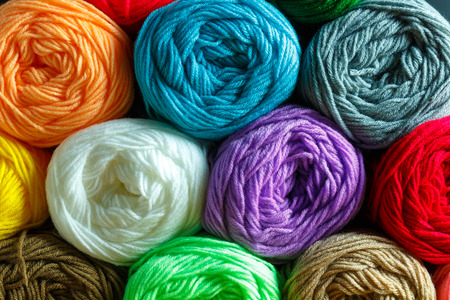 close up colorful wool  detail on wooden table background and conceptの写真素材