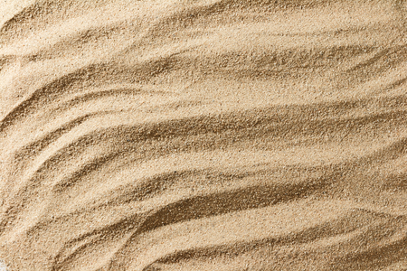 close up texture of sand beach from top view for wallpaper backgroundの写真素材