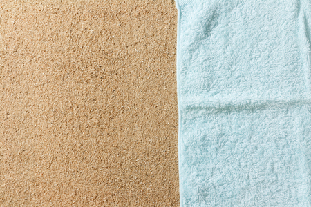 blue fabric on sand of beach from top view relaxation conceptの写真素材