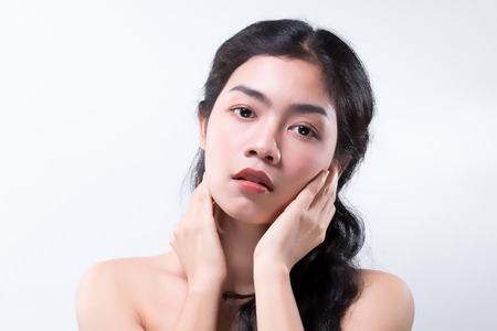 close up beautiful asian woman long black curly hair on backgroundの写真素材