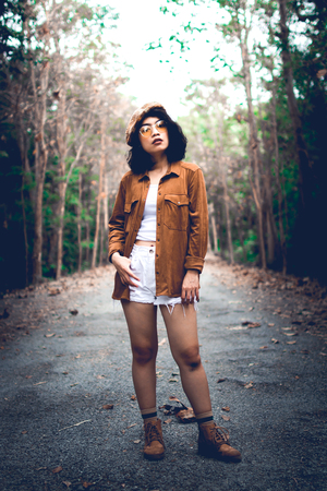 beauty asian woman traveler at beautiful place with vintage tone and soft focus effect