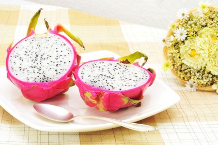Vietnamese dragon fruit on a white plate.の写真素材