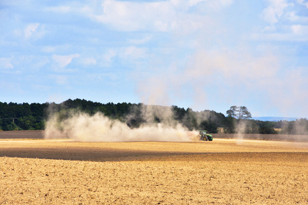 Tractor on a dry fieldのeditorial素材