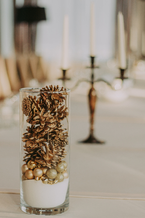 Glass dishes on a table on a white tablecloth. clean and empty. lovely, chic restaurant. cozy atmosphere.の写真素材
