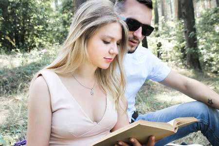 beautiful couple in love kissing outdoorsの写真素材