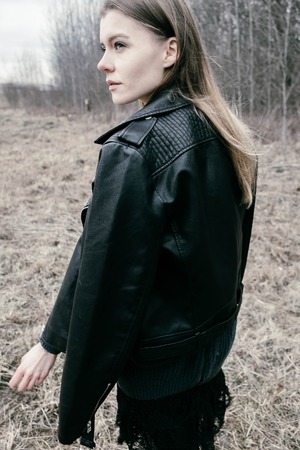 portrait of the blonde girl in the woodsの写真素材